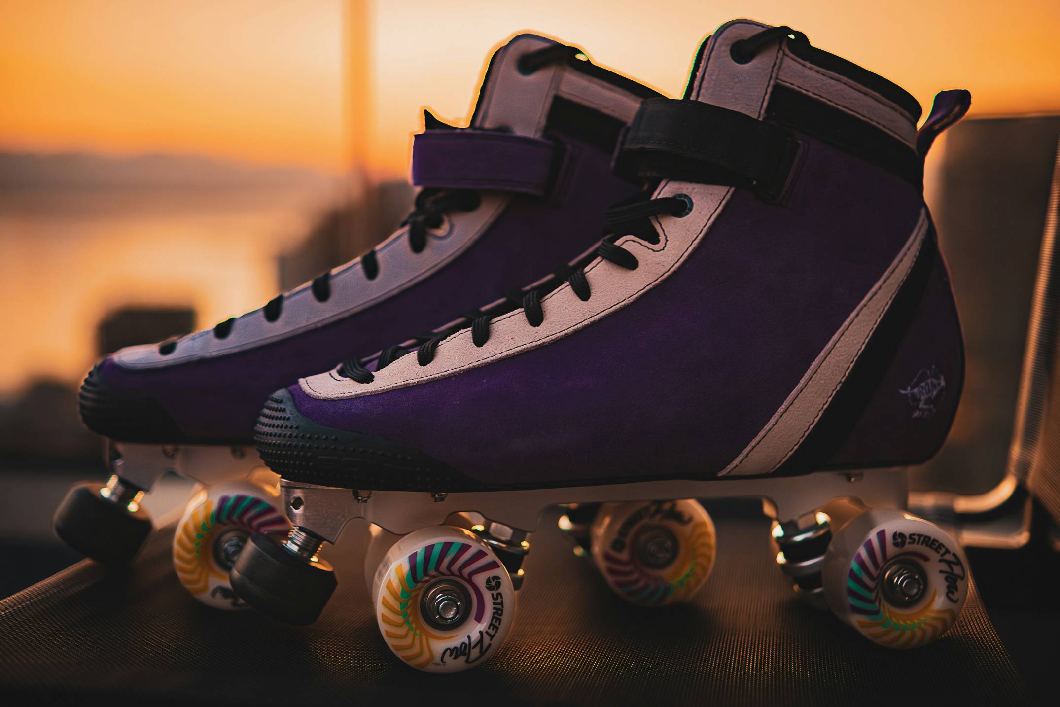 a pair of roller skates sitting on top of a table