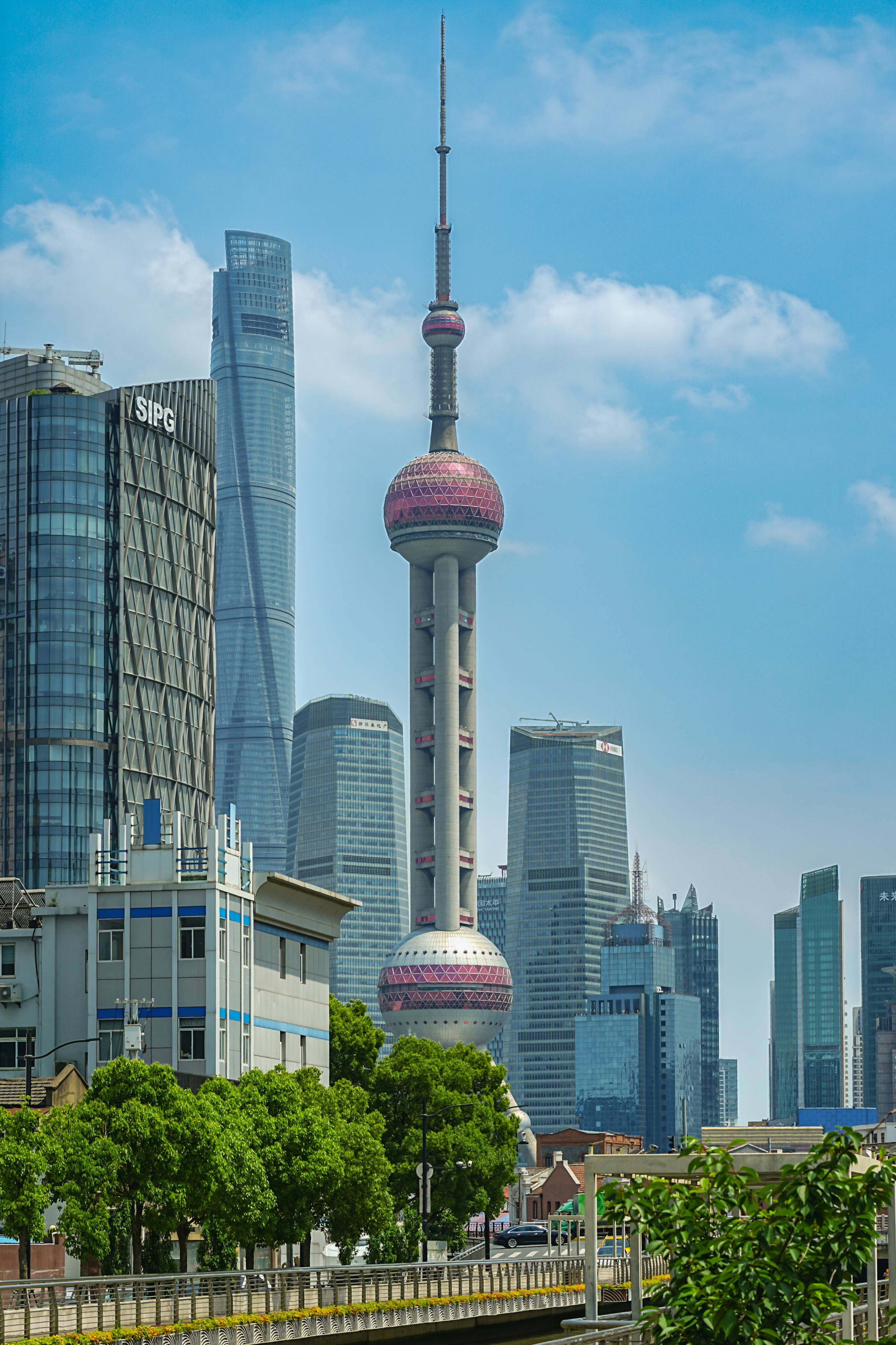 a view of a city skyline with a bridge in the foreground