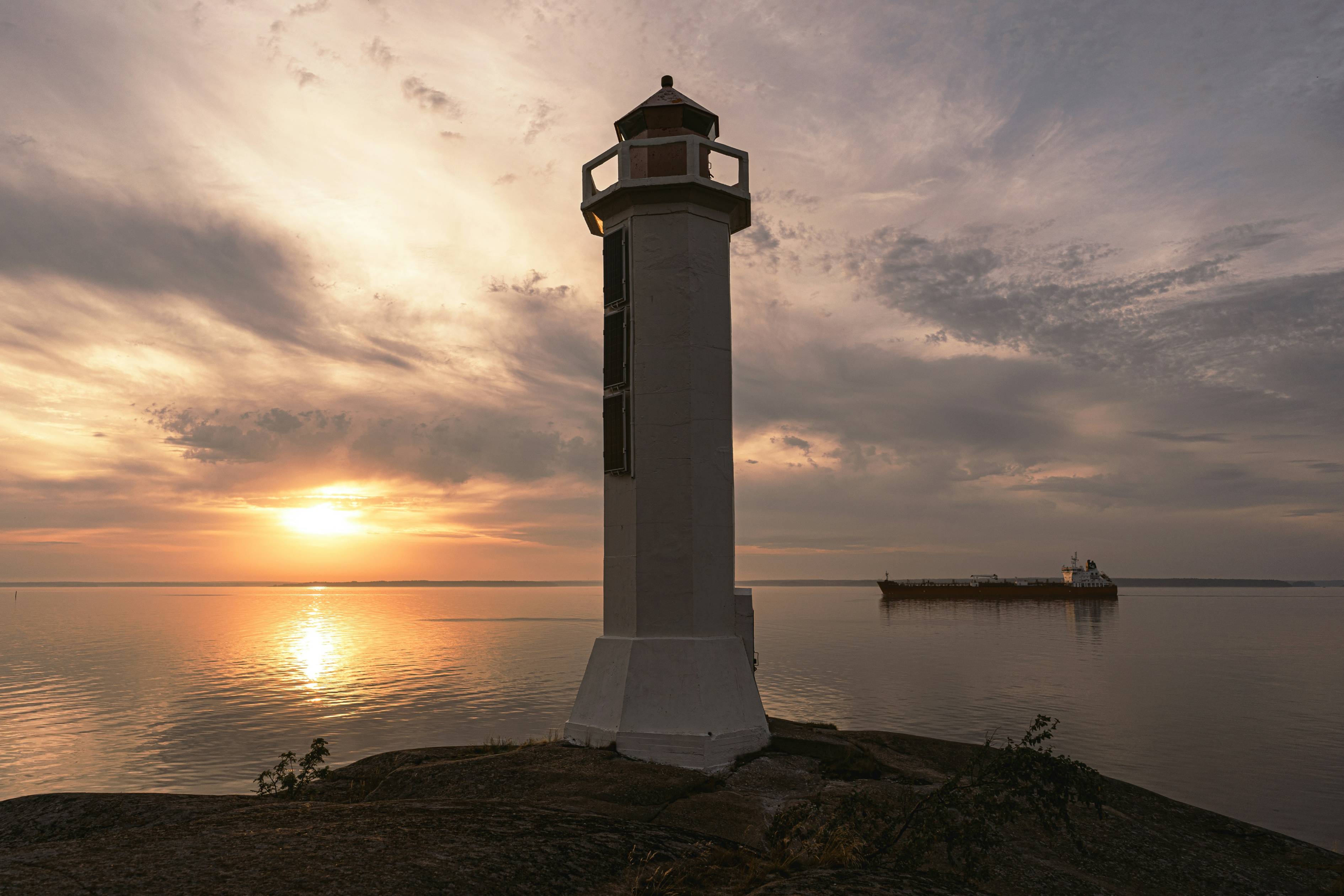 a lighthouse on a rocky shore